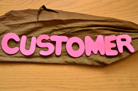 word customer on an abstract backgroundの写真素材