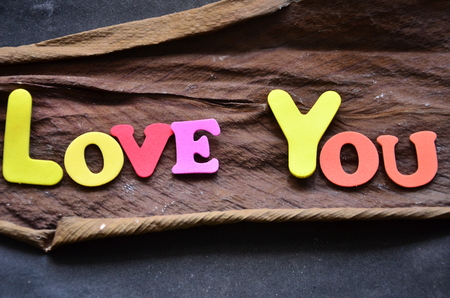 Word LOVE YOU on an abstract backgroundの写真素材