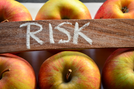 word risk on an abstract backgroundの写真素材