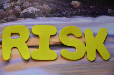 word risk on an abstract backgroundの写真素材