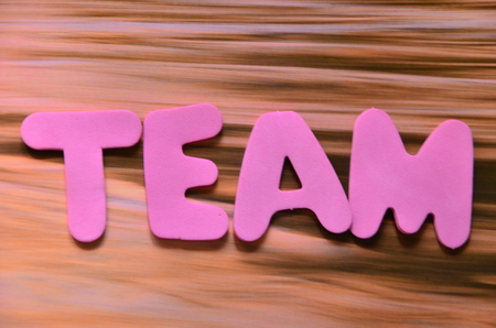 word team on an abstract backgroundの写真素材