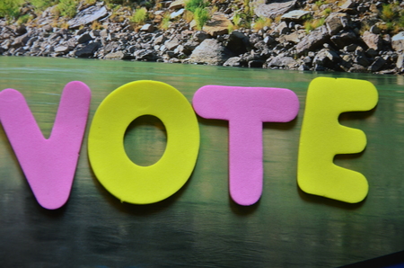 word vote on an abstract backgroundの写真素材