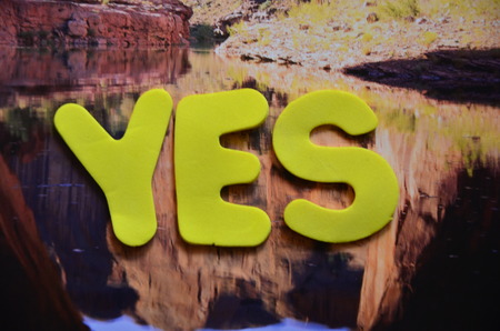 word yes on an abstract backgroundの写真素材
