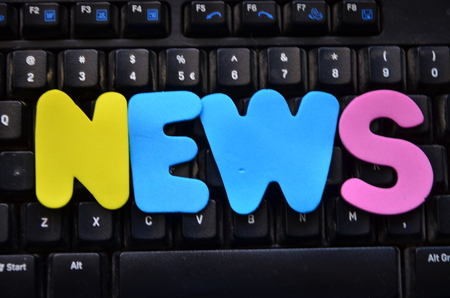 word news on an abstract backgroundの写真素材