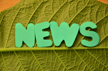 word news on an abstract backgroundの写真素材