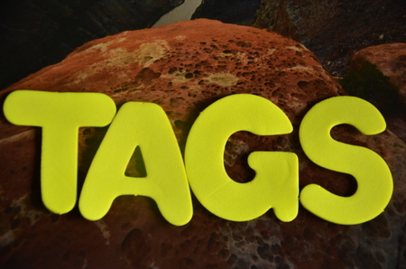 Word tags on an abstract backgroundの写真素材