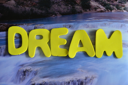 Word dream on an abstract background
