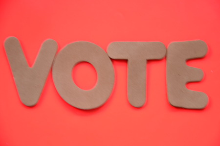 word vote on an abstract backgroundの写真素材