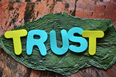 word trust on an abstract background
