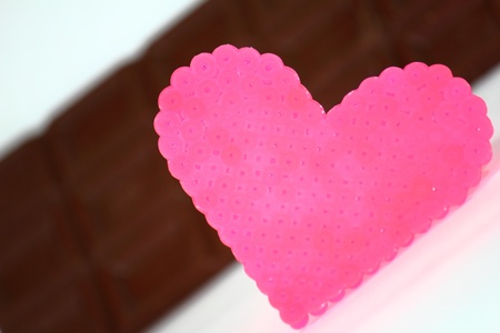 A pink heart of beading and milk chocolate
