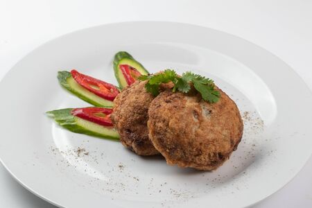 Meat cutlets with paprika and cucumberの写真素材