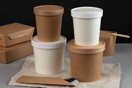 Eco packaging - soup in a craft glass for soup for a delivery service. Vegan food.の写真素材
