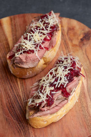 Snack - Italian bruschetta on a wooden board, traditional food, high keyの写真素材