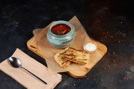 Borsch traditional ukraine soup, dark background