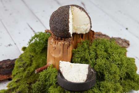 Belper knolle Is a hard Swiss cheese in the form of small balls sprinkled with black pepper