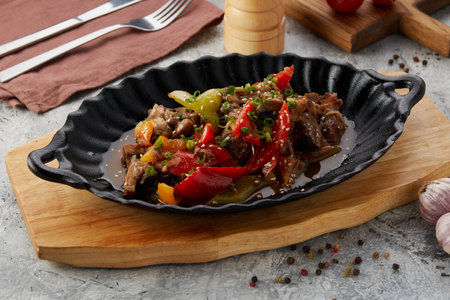 vegetables with lamb stewed on a cast-iron dishの写真素材