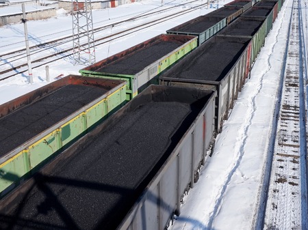 Railway transport. Transportation of coal in wagons. Energy resource, extraction of minerals.の写真素材