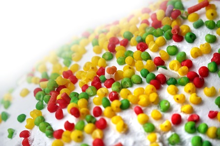 Background. Easter cake. Multicolored powder. Macro photo.