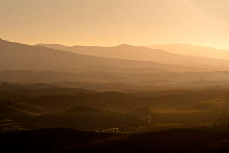 view of hills at dawn in Tuscanyの写真素材