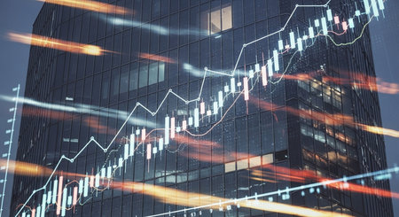 Forex chart on cityscape with tall buildings. Trade and finance concept. Double exposureの素材