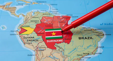 Suriname flag on the map with red pen. 3D illustration.の素材