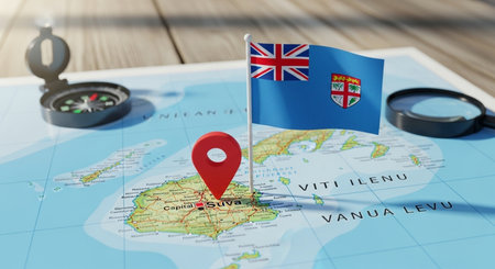 Magnifying glass and map with flag of Fiji. Travel and tourism concept.の素材