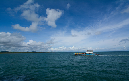 Boat under the cloudy sky.の写真素材
