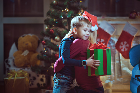 Mother and son exchanging Christmas giftsの写真素材