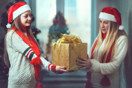 Young Christmas girls smiling with happy expressionの写真素材