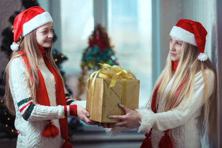 Young Christmas girls smiling with happy expressionの写真素材