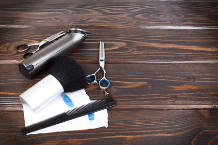 Hairdresser set with various accessories on backgroundの写真素材