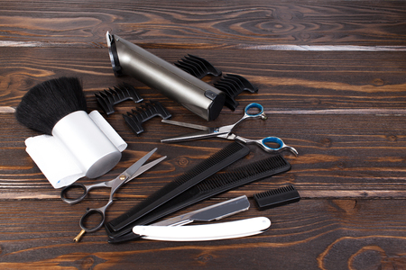 Hairdresser set with various accessories on backgroundの写真素材