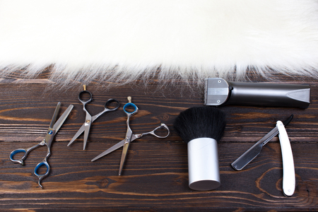 Hairdresser set with various accessories on backgroundの写真素材
