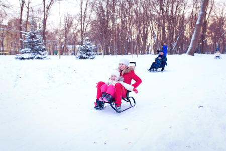 daughter and mother are happy together in winter の写真素材