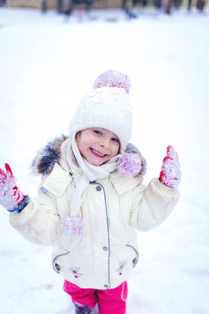 Little girl having fun on winter dayの写真素材