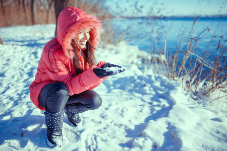 a beauty girl on the winter backgroundの写真素材