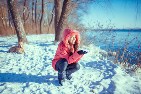 a beauty girl on the winter backgroundの写真素材