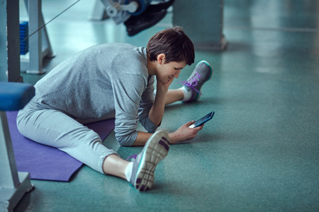 Fitness - concept of healthy lifestyle. Perfect fitness body.の写真素材