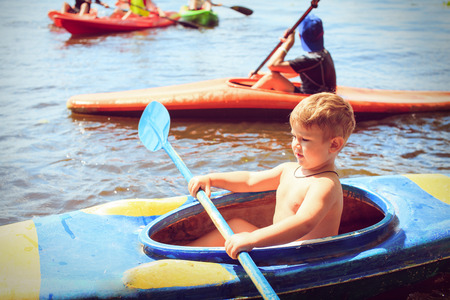 man paddling in kayak is on a river, kayakingの写真素材