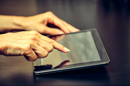 Business Woman Holding a Tablet Computer.
