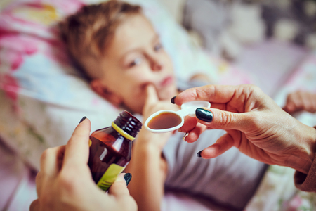 The child is ill while in the hospital.の写真素材