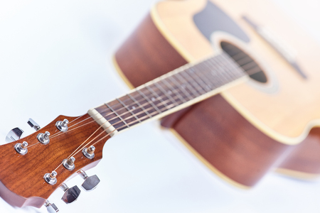 Classical acoustic guitar isolated on a white background
