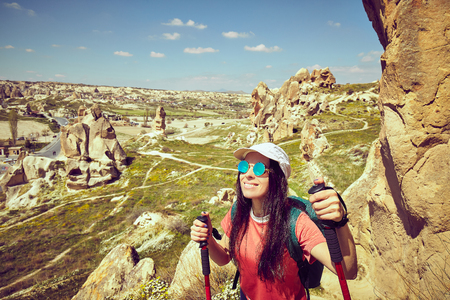 Pedestrian tourism, people travel with backpacks, in the open air.の写真素材