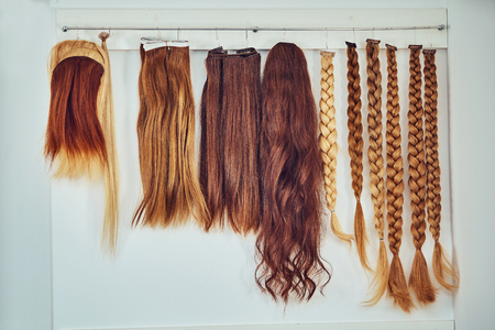 Hair extension equipment of natural hair. hair samples of different colorsの写真素材
