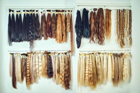 Hair extension equipment of natural hair. hair samples of different colorsの写真素材