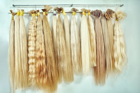 Hair extension equipment of natural hair. hair samples of different colorsの写真素材
