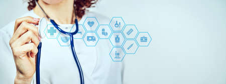 Female Doctor With Stethoscope On Isolated Backgroundの写真素材