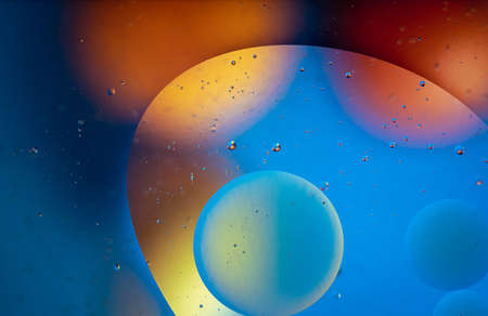 Abstract space wallpaper with form of letter O and sparks of light with copy space. Grunge abstract...