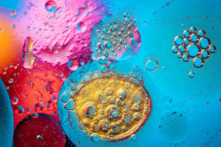 Abstract space wallpaper with form of letter O and sparks of light with copy space. Grunge abstract background.の写真素材