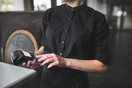 Waiter, account, Credit card terminal.の写真素材